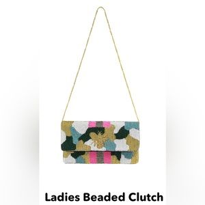 Cross body/ clutch /wristlet - fun to pair with white shirt and light jeans!